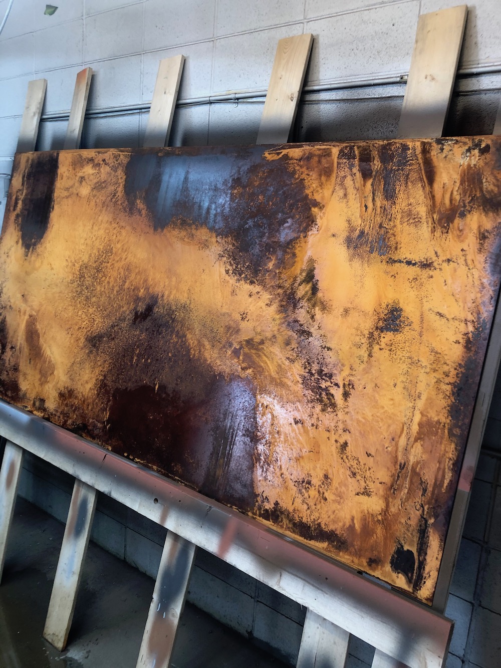 Large steel sheet with custom rusted surface