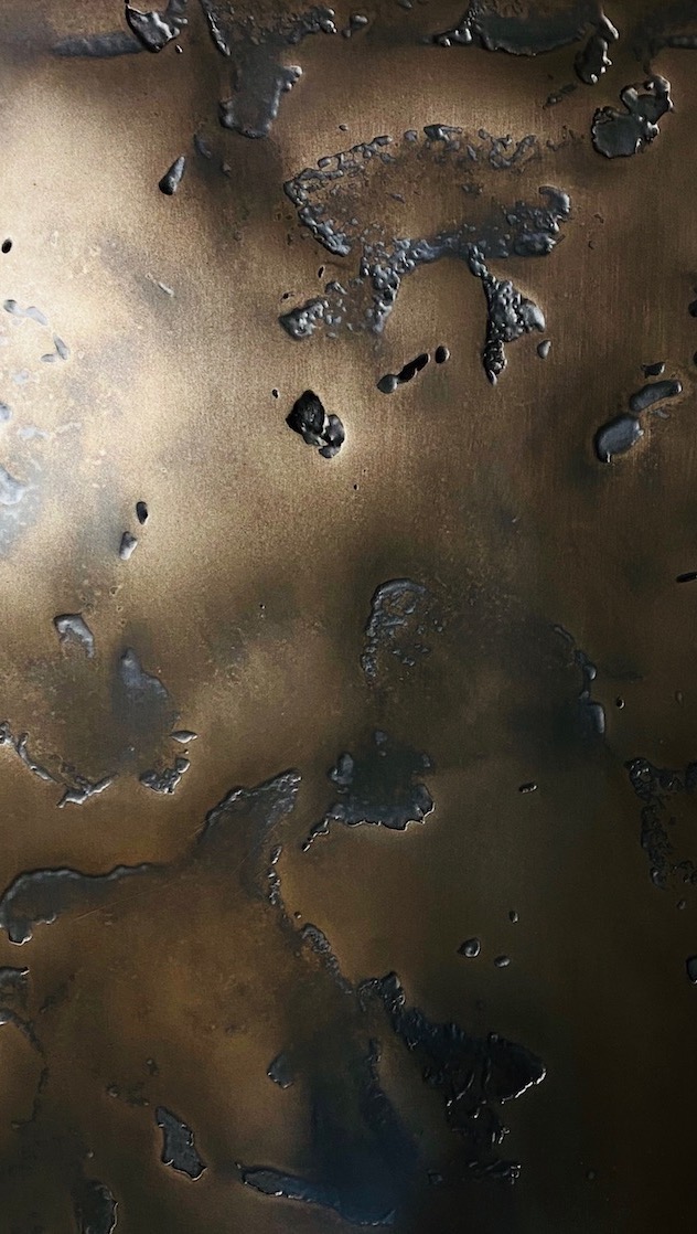 Heavily textured bronze sample