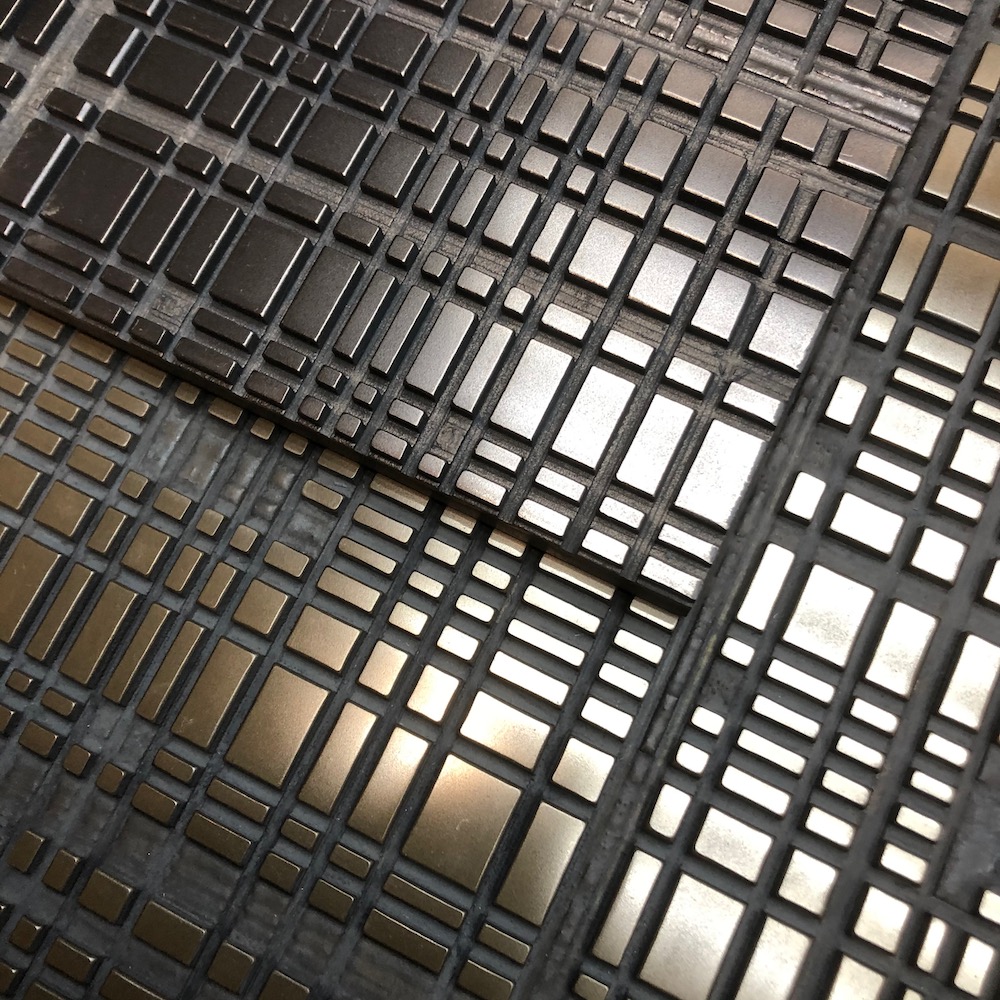 Custom panels with digital texture coated with real brass and bronze