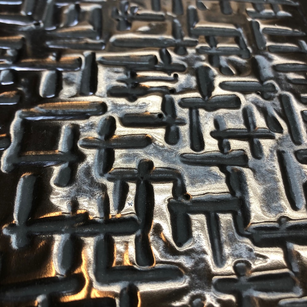 Black Bronze sample with pick hammer texture