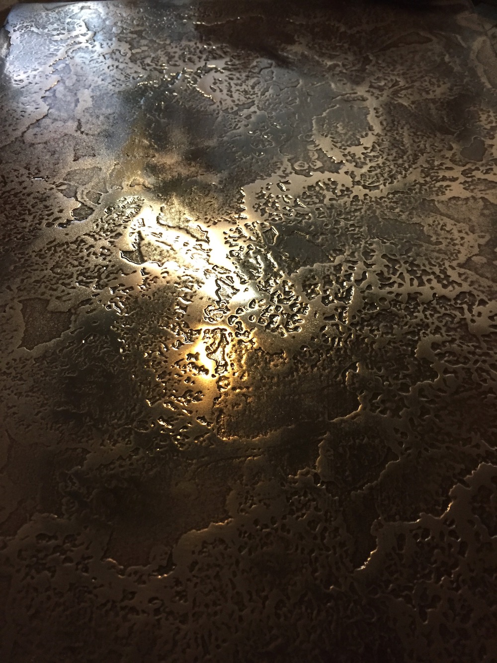 Copper with storm texture and blackened finish 