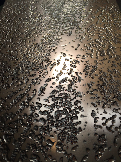 Sample of pitted black copper texture